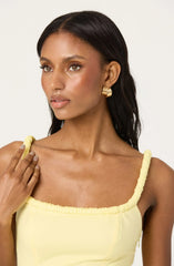 Sleeveless Bubble Hem Peplum Top